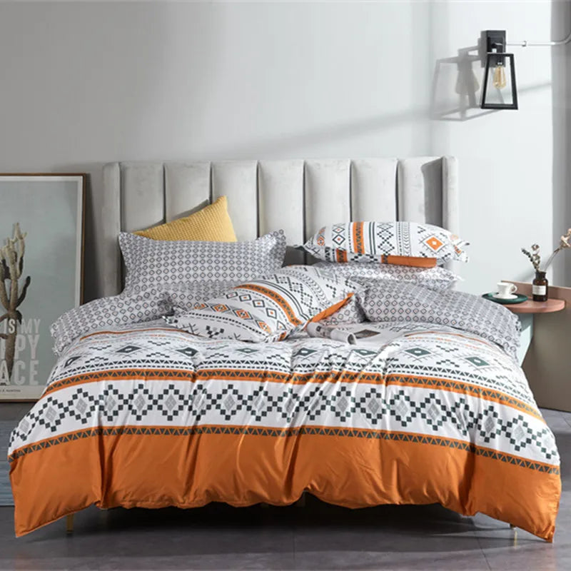 Housse de couette bohème géométrique orange sur lit queen
