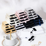 Ensemble de 5 boîtes de rangement en carton blanc empilées