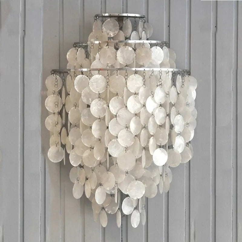 Éclairage doux applique murale coquillage chambre