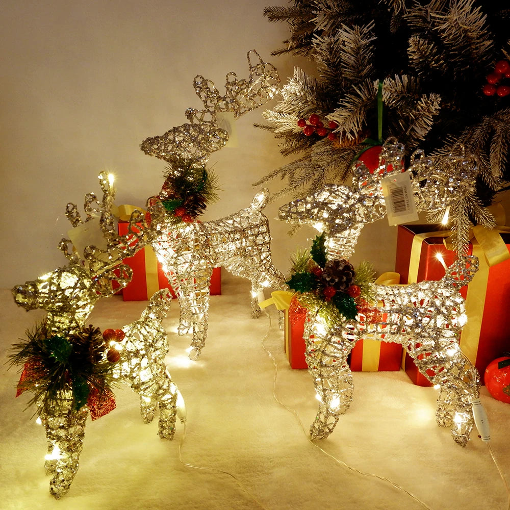 Renne lumineux LED de Noël vert menthe décoré d'un pin