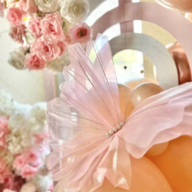 Décoration baby shower avec papillons jaune fluo