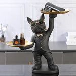 Statue bouledogue vert clair avec deux plateaux métal sur étagère