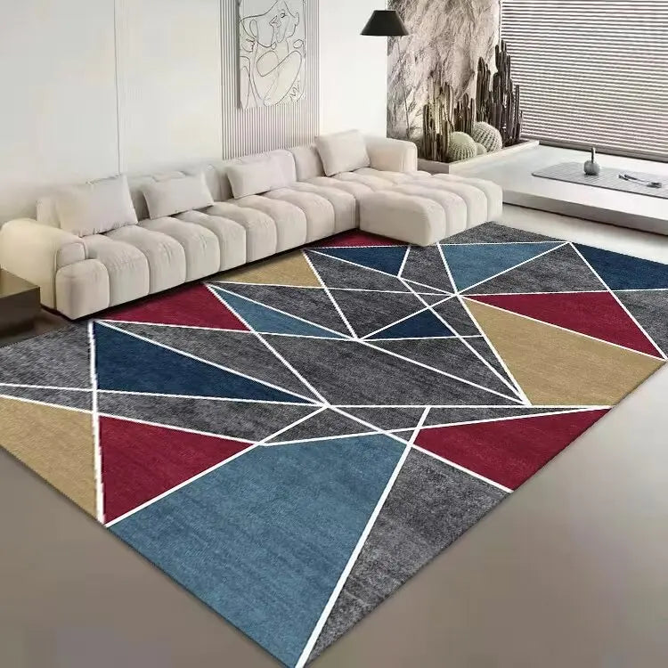 Tapis géométrique aux motifs abstraits colorés dans un salon moderne avec un canapé d'angle blanc.