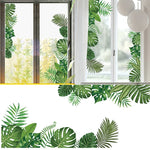 Autocollant mural feuilles tropicales vertes sur mur blanc