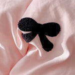 Housse de couette noire avec motif nœud