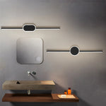 Applique murale LED dorée moderne dans une salle de bain