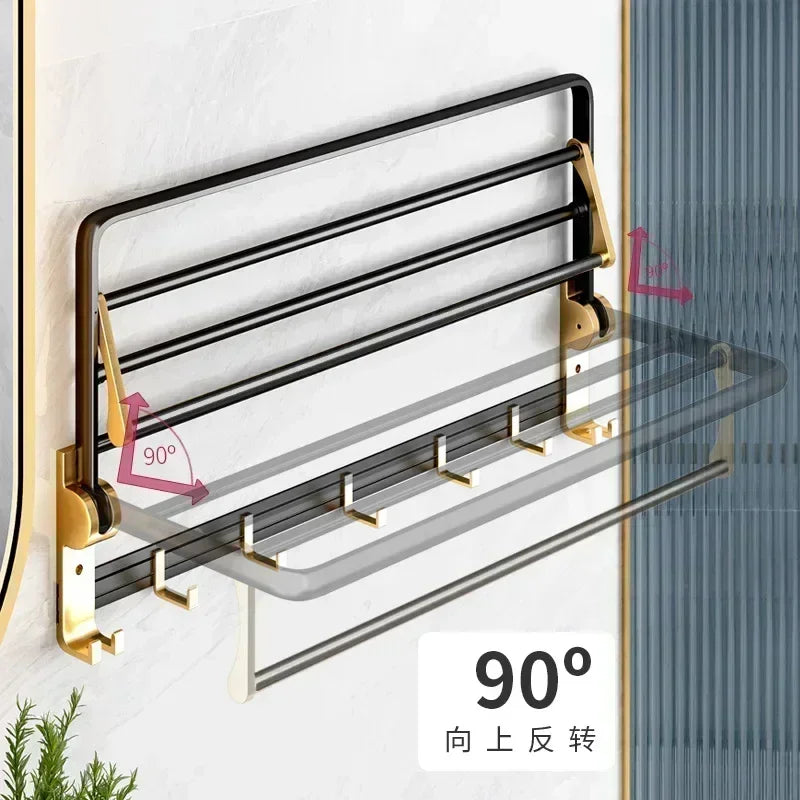 Détail de la finition oxydée noir et or du porte-serviettes
