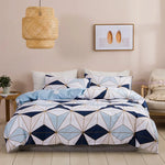 Housse de couette moderne motif géométrique vert sur lit King