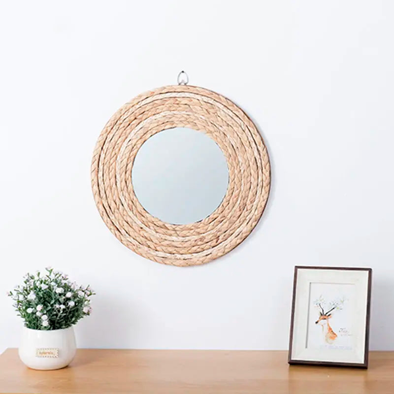 Détail du tissage en rotin du miroir rond décoratif