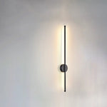 Applique murale LED éclairant un mur TV dans un salon contemporain