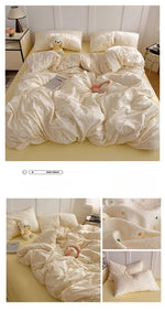 Ensemble literie complet avec drap et taies d'oreiller sur lit