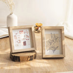 Cadre photo rectangulaire en bois dans un salon décoré