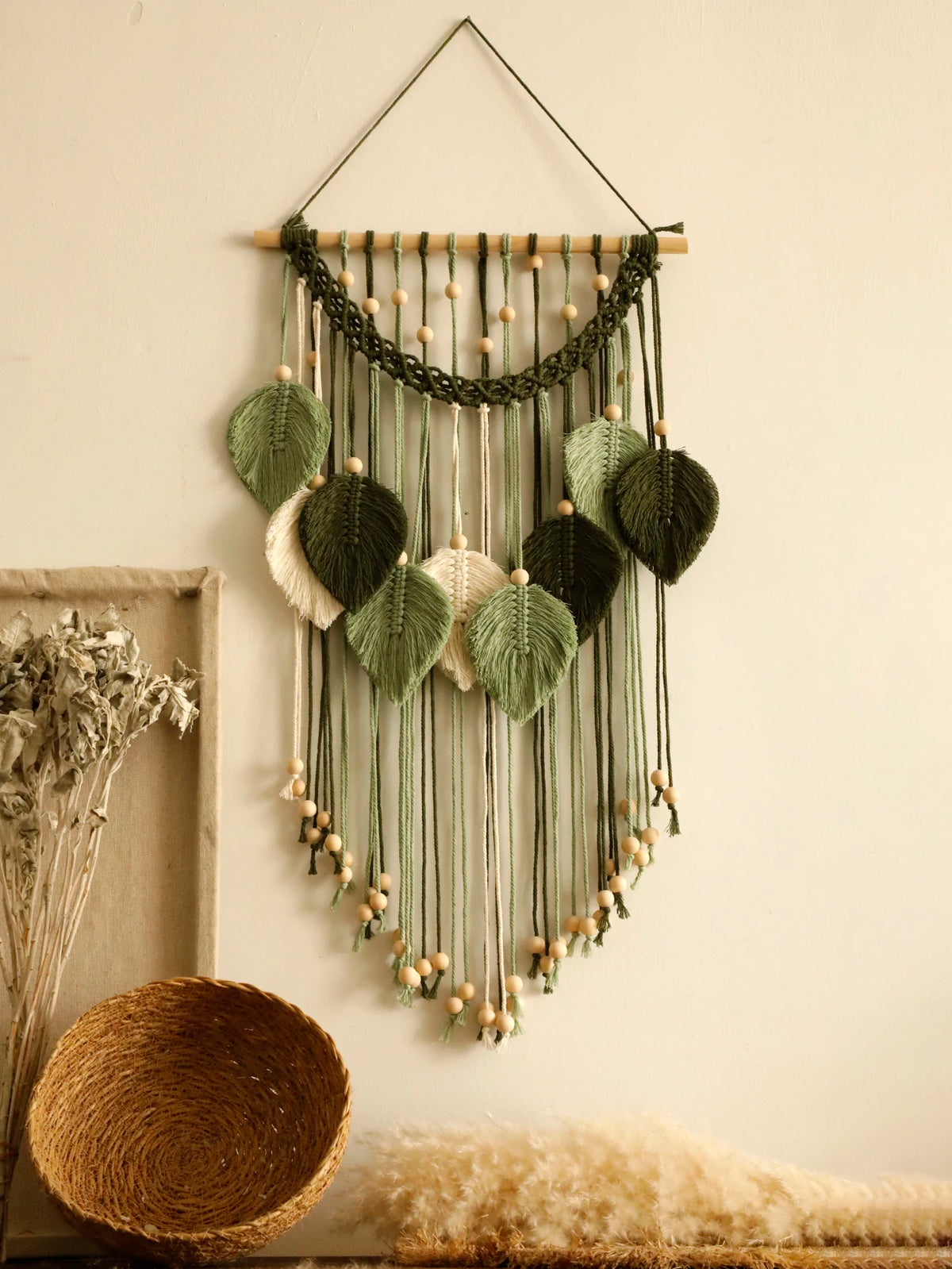 Détail du tissage en coton naturel de la tenture macramé
