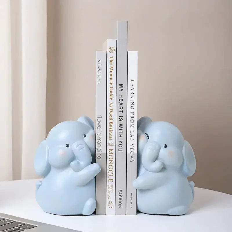 Serre-livres canard noir avec livres dans un bureau