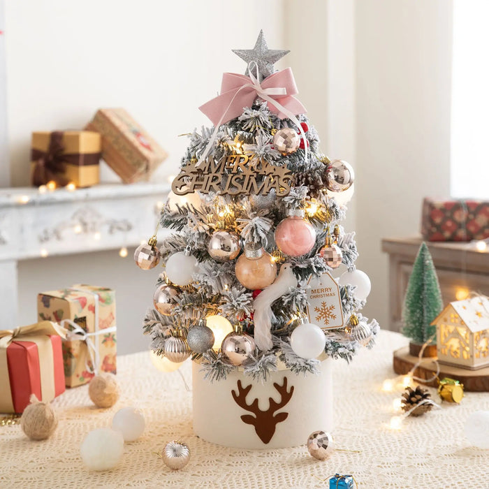 Sapin de Noël lumineux vert menthe 45cm sur bureau moderne