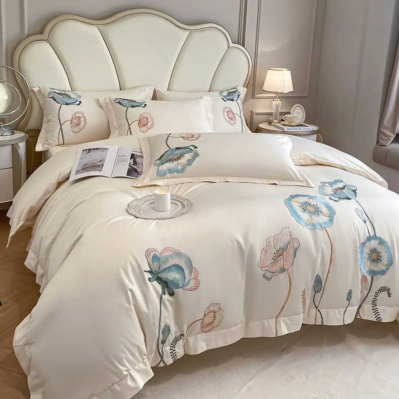 Housse de couette beige 220x240 avec broderie chic sur lit