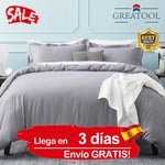 Lot de 3 housses de couette unis en coton doux pose sur un lit