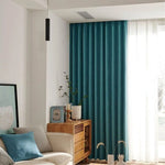 Rideau bleu élégant pour salon, ajoutant une touche moderne et sophistiquée à votre décoration intérieure. Parfait pour contrôler la luminosité et apporter une ambiance chaleureuse. Idéal pour les espaces de vie contemporains. Découvrez comment transformer votre pièce avec un style unique et attrayant.