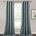 Paire de rideaux opaques bleus avec œillets, idéale pour salon ou chambre, apportant élégance et confort à votre intérieur. Design moderne et élégant pour embellir vos fenêtres tout en bloquant la lumière. Agrémentez votre décoration avec ces rideaux tendance et pratiques.