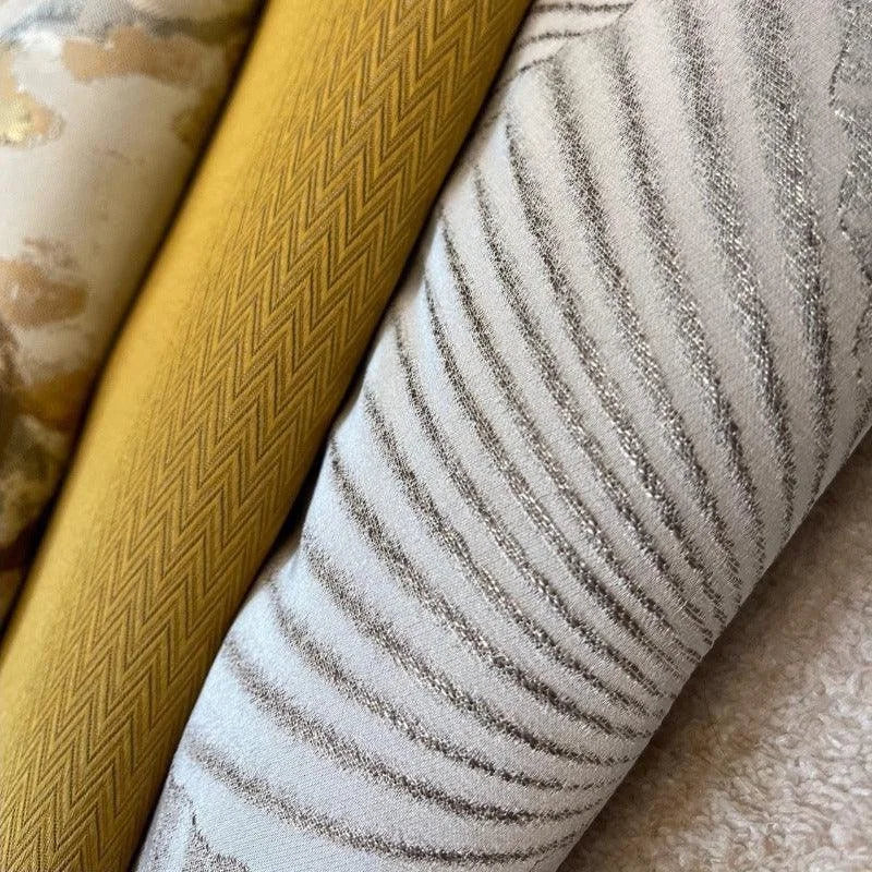 Échantillons de textiles élégants avec divers motifs et couleurs, idéaux pour la décoration intérieure ou la fabrication de vêtements personnalisés. Explorez des designs variés pour embellir votre espace ou créer des pièces uniques selon vos goûts.