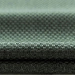 Texture tissée verte de qualité supérieure, idéale pour décoration intérieure et mode, offrant un style élégant et moderne grâce à son design géométrique distingué.