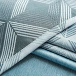 Tissu élégant avec motifs géométriques en losanges, idéal pour la décoration d'intérieur, ajoutant une touche moderne et sophistiquée à tout espace. Parfait pour les rideaux, nappes ou coussins.