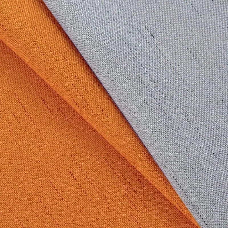 Rideau moderne bicolore avec design élégant en teinte orange et gris, ajout de style chic à tout intérieur. Idéal pour le salon ou la chambre.