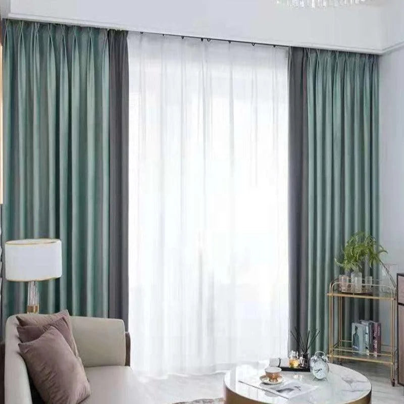 Rideaux élégants verts pour salon moderne, offrant un mélange de design contemporain et d'intimité. Ces rideaux longs sont parfaits pour habiller les fenêtres tout en ajoutant une touche de sophistication à votre décoration intérieure. Combinez fonctionnalité et esthétique pour un espace de vie accueillant et lumineux.