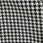 Motif pied-de-poule noir et blanc élégant, idéal pour une tenue tendance et intemporelle. Parfait pour un look chic et sophistiqué.