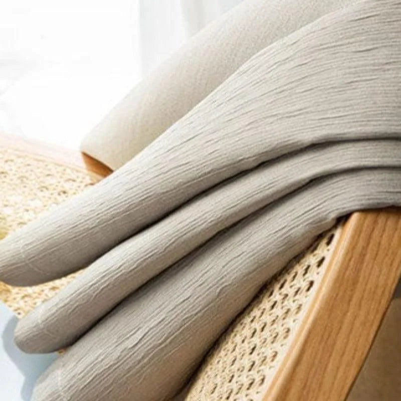 Ensemble de draps élégants beige, idéal pour une décoration de chambre moderne et épurée, apportant une touche de sophistication et de confort. Parfaits pour créer une atmosphère relaxante et chaleureuse, ces draps s'adaptent à tout style intérieur.
