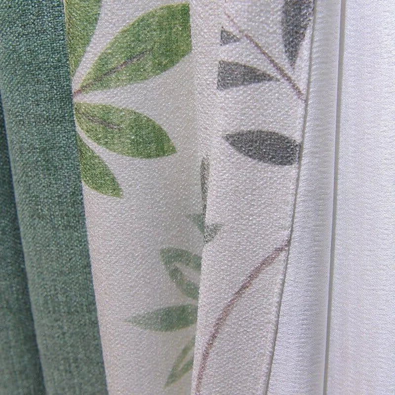 Rideaux décoratifs avec motifs de feuilles vertes et nuances de gris, parfaits pour ajouter une touche de fraîcheur et d'élégance à votre intérieur. Idéal pour salon, chambre ou bureau, ces rideaux modernisent votre espace tout en offrant une ambiance naturelle.