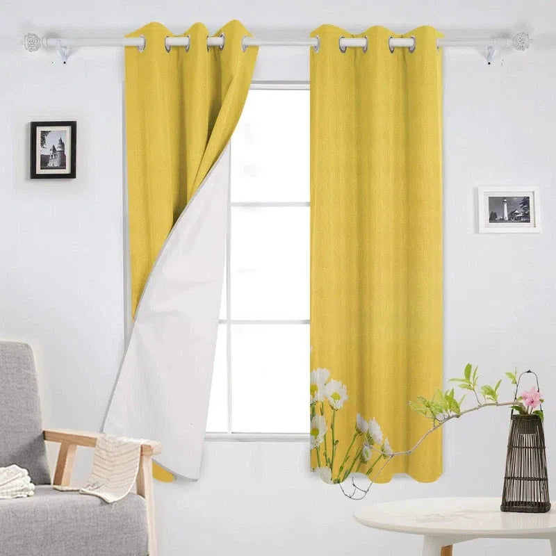 Rideaux jaunes avec motif floral, parfaits pour la décoration de salon, offrant une ambiance lumineuse et élégante. Ce modèle contemporain avec œillets s’intègre facilement dans tout type d’intérieur. Idéal pour ajouter une touche de couleur et de style à votre espace de vie.