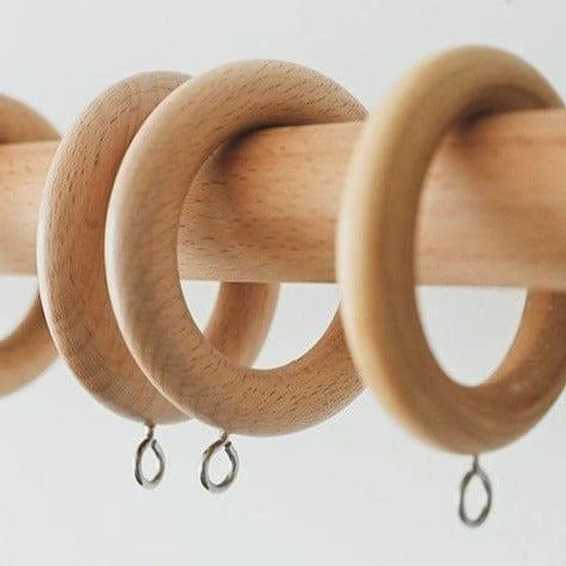 Anneaux de rideau élégants suspendus sur une tringle, design moderne pour une décoration intérieure raffinée, accessoire de maison pratique et esthétique, solution pour valoriser vos fenêtres et habiller vos espaces avec style.