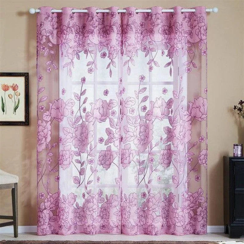 Rideau rose avec motif floral, idéal pour apporter une touche élégante et romantique à votre intérieur. Cette tenture ajoute un charme subtil à vos fenêtres tout en permettant une belle luminosité dans la pièce. Parfaite pour le salon ou la chambre à coucher, elle crée une ambiance douce et apaisante.