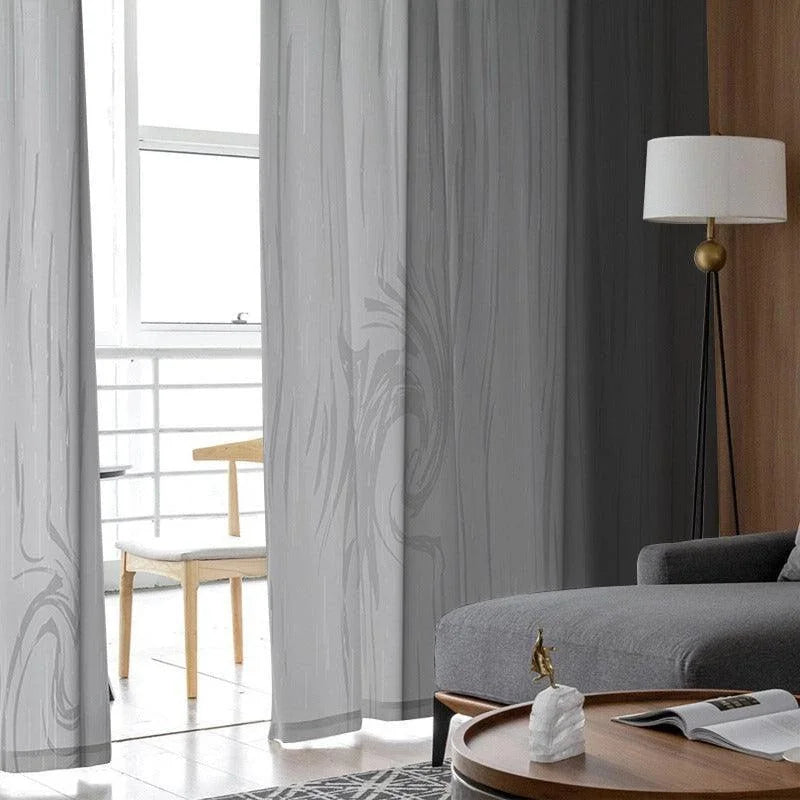 Rideaux élégants gris avec motif subtil pour salon moderne, laissant passer la lumière naturelle tout en préservant l'intimité. Ajoutez une touche contemporaine à votre intérieur grâce à ces rideaux sophistiqués, parfaitement adaptés à un décor minimaliste. Idéal pour créer une ambiance chaleureuse et accueillante dans votre maison.