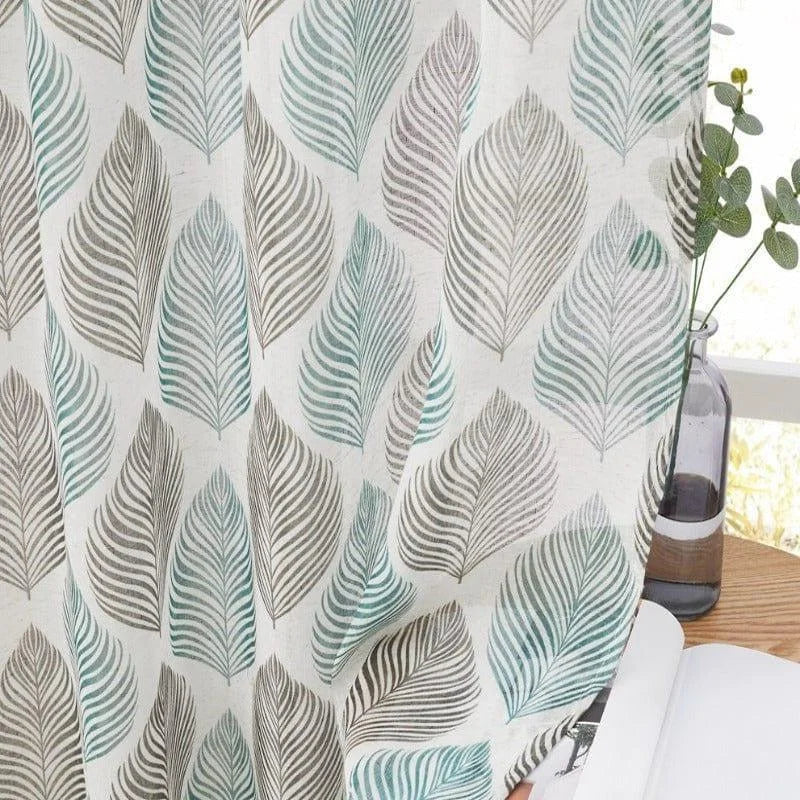 Rideau décoratif avec motif de feuilles colorées, parfait pour ajouter une touche naturelle et élégante à votre intérieur. Ce rideau aux tons verts et beiges apporte une ambiance sereine et accueillante à votre salon ou chambre. Accessoire indispensable pour une décoration moderne et raffinée.
