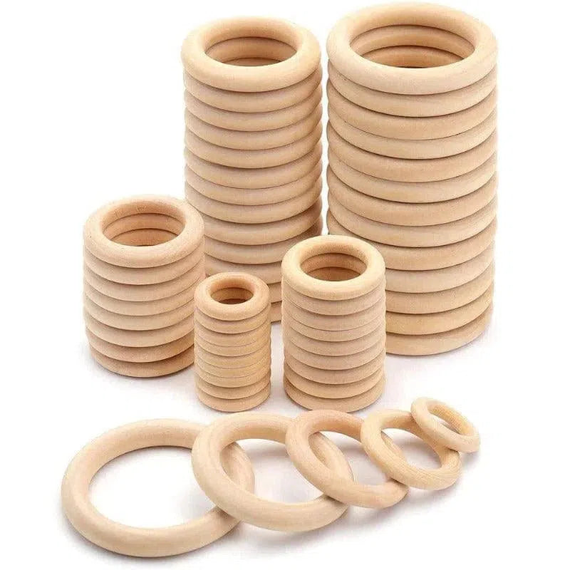Anneaux empilables de différentes tailles pour activités créatives ou éducatives. Ensemble polyvalent pour jeux sensoriels, idéal pour les enfants et les projets d'artisanat. Accessoires parfaits pour développer la dextérité et l'imagination.