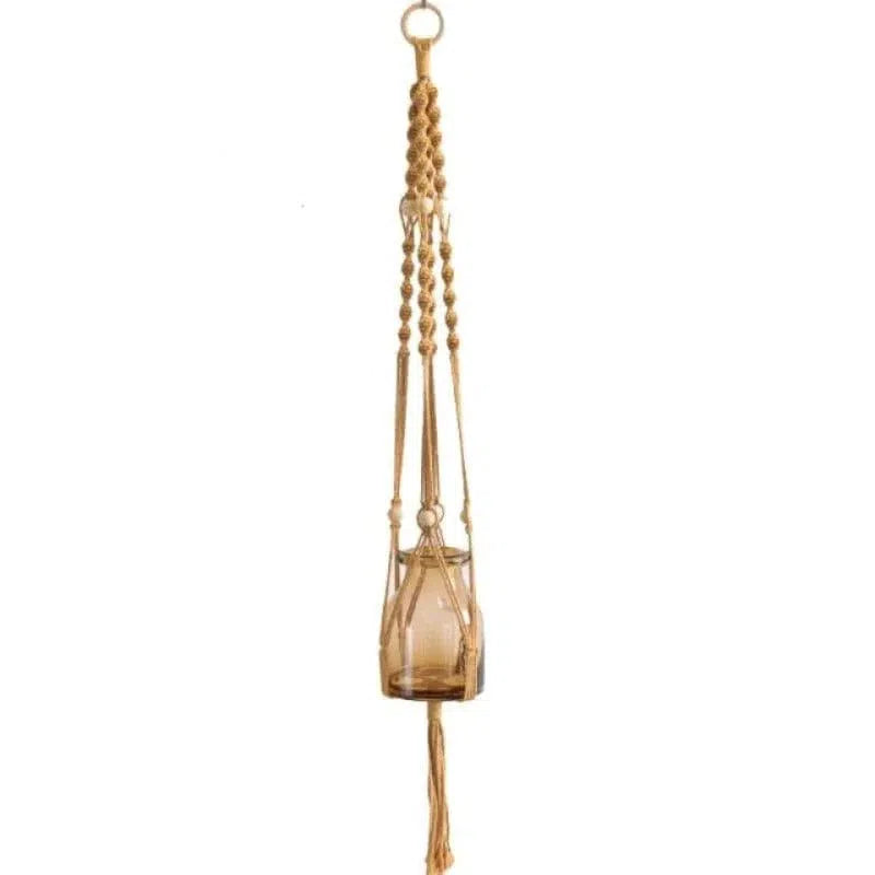 Support de pot de fleurs suspendu, parfait pour la décoration intérieure, ajoutant une touche bohème et élégante à votre espace. Idéal pour présenter vos plantes préférées dans votre salon ou jardin. Facile à installer et à intégrer dans tous les styles de décoration.