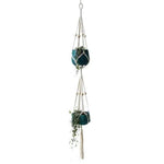 Suspension pour plantes vertes modernes, décoration intérieure élégante, idéale pour suspendre des pots de fleurs dans le salon, atmosphère naturelle et épurée, design unique pour optimiser l'espace.