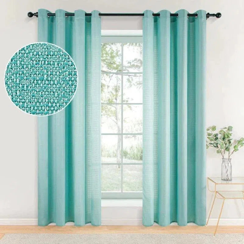 Rideau turquoise moderne pour salon, avec œillets noirs pour une installation facile. Idéal pour ajouter une touche de couleur et de luminosité à votre intérieur. Convient parfaitement aux fenêtres de salon ou chambre à coucher pour une ambiance élégante et rafraîchissante. Accessoire décoratif essentiel pour embellir votre pièce.