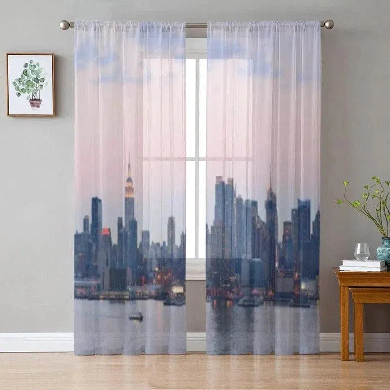 Rideaux décoratifs avec impression de ligne d'horizon urbaine au crépuscule, apportant une touche moderne et élégante à votre intérieur. Ces rideaux créent une ambiance apaisante avec une vue panoramique sur la ville, idéale pour le salon ou la chambre à coucher. Améliorez votre décoration avec ces rideaux qui laissent passer la lumière tout en préservant l'intimité. Fácil à installer et à intégrer dans n'importe quel style de décoration.