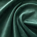 Rideau élégant vert foncé ondulé, idéal pour ajouter une touche de sophistication et de confort à votre intérieur. Ce rideau moderne et stylé s'adapte parfaitement aux salons, chambres ou bureaux, apportant une ambiance chaleureuse et accueillante.