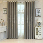 Rideau élégant gris avec motif d'arbres, idéal pour salon moderne. Ce rideau confère une ambiance cosy et nature à votre intérieur. Parfait pour la décoration de fenêtres de style contemporain, il procure une touche sophistiquée et apaisante à toute pièce. Adapté aux décorations raffinées, ce rideau s'intègre harmonieusement dans divers environnements domestiques.
