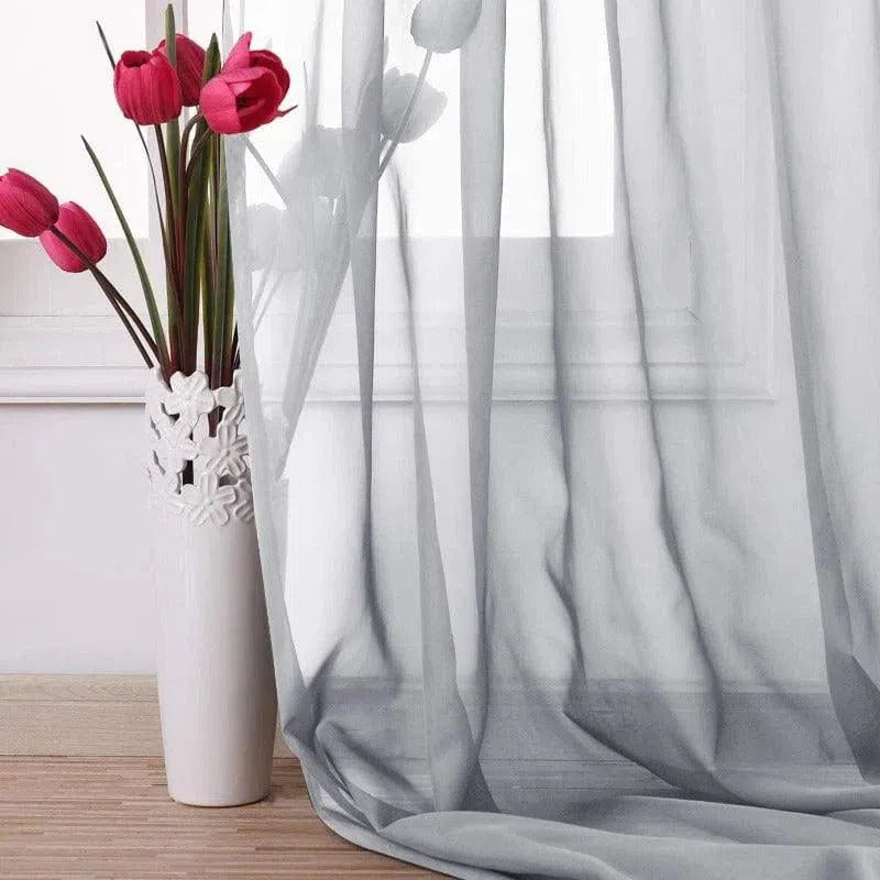 Voile élégant pour fenêtre, ajout chic et moderne à votre intérieur. Idéal pour filtrer la lumière tout en préservant l'intimité. Parfait pour le salon ou la chambre, il s'associe harmonieusement avec tout type de décoration. Améliorez l'esthétique de votre pièce avec ce rideau raffiné.