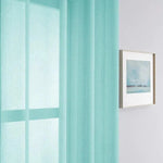 Rideau turquoise moderne et élégant pour décoration intérieure, parfait pour habiller les fenêtres et apporter une touche de fraîcheur à votre espace de vie. Idéal pour créer une ambiance lumineuse et accueillante.