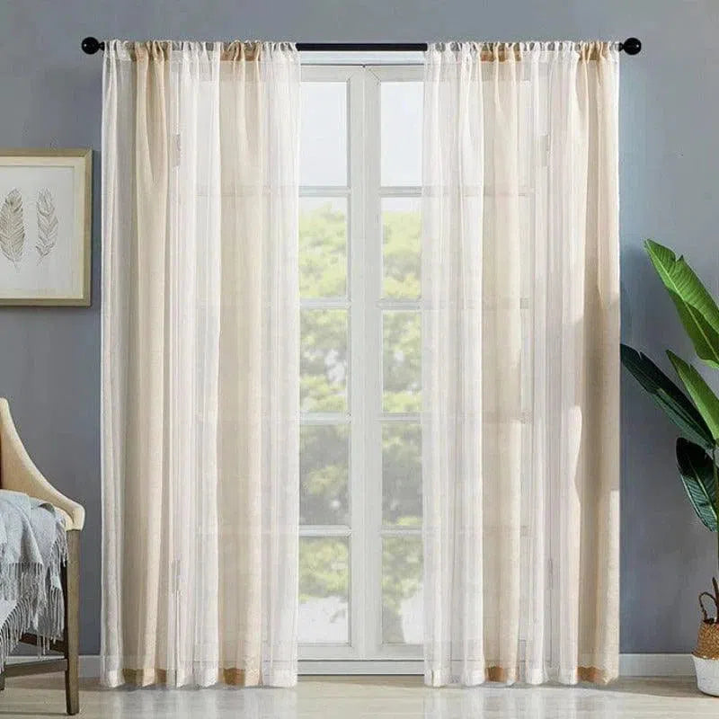 Rideaux légers et élégants, parfaits pour illuminer votre salon avec une touche de fraîcheur. Ces voilages raffinés s'adaptent à tout type de décoration intérieure, apportant luminosité et douceur à votre espace. Accessoire idéal pour une ambiance chaleureuse et accueillante.